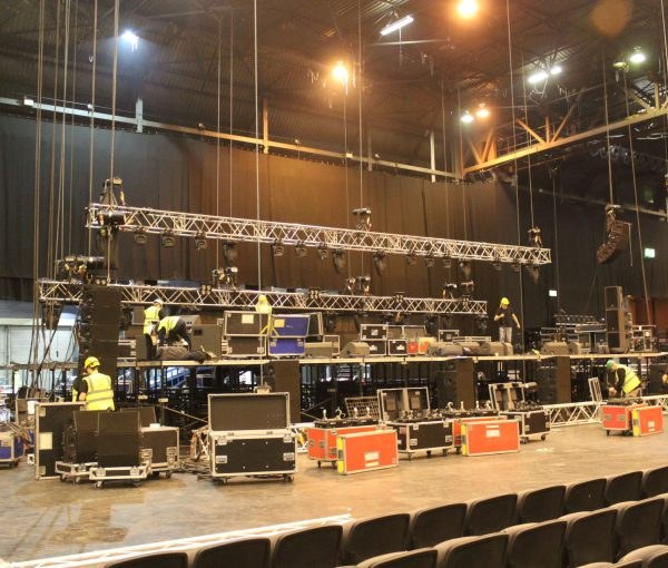 Truss lighting rig installed above a stage